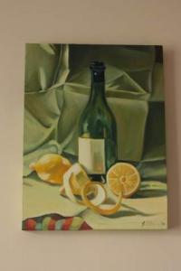 Green bottle and lemons