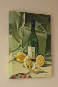 Green bottle and lemons